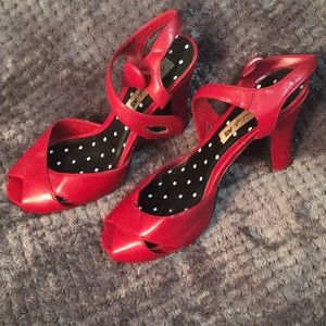 Red peep-toe heels.